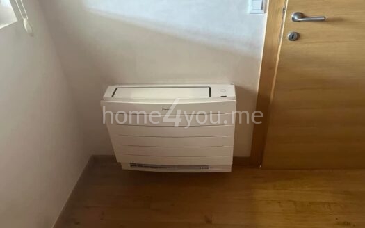 Dvosoban stan sa garažnim mjestom u zgradi Okova Rozinu, Budva