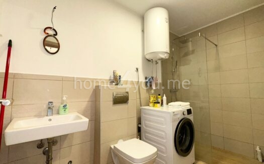 Modern three-bedroom apartment with garage space in the Old bakery complex, Budva