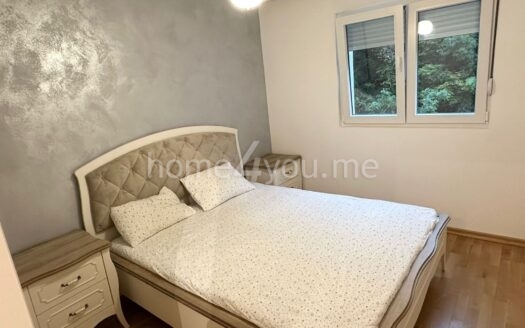 Modern three-bedroom apartment with garage space in the Old bakery complex, Budva