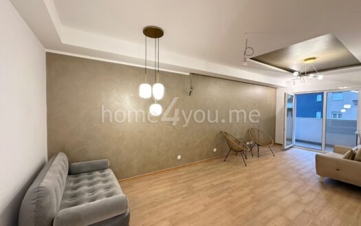 Modern three-bedroom apartment with garage space in the Old bakery complex, Budva