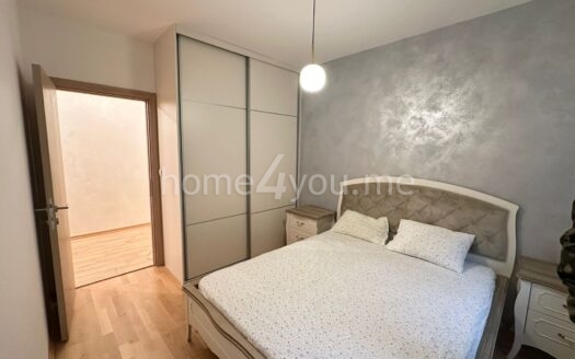 Modern three-bedroom apartment with garage space in the Old bakery complex, Budva