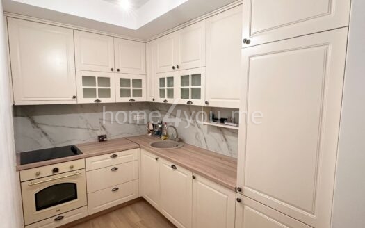 Modern three-bedroom apartment with garage space in the Old bakery complex, Budva