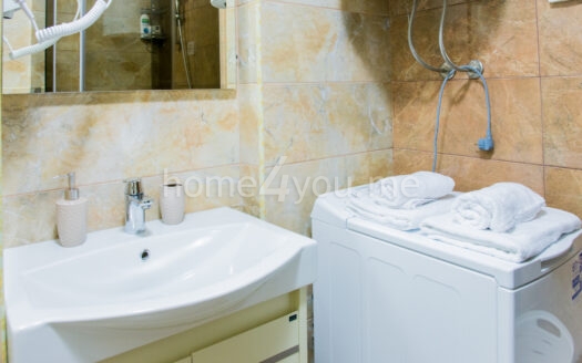 Oднокомнатная квартира на первой линии моря в здании Harmonija в Будве