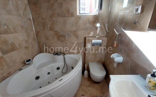 Completely renovated two-bedroom apartment with three terraces in Budva