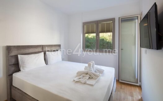 New one-bedroom apartment with parking space in Bečići, Budva