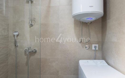 New one-bedroom apartment with parking space in Bečići, Budva