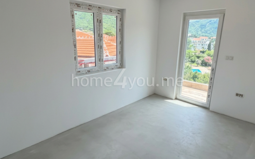 Two-bedroom apartment with parking space in a residential complex with a swimming pool, Lastva Grbaljska, Budva